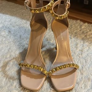 Stuart Weitzman Patent leather & Gold Strappy 4 inch heel.   Excellent condition